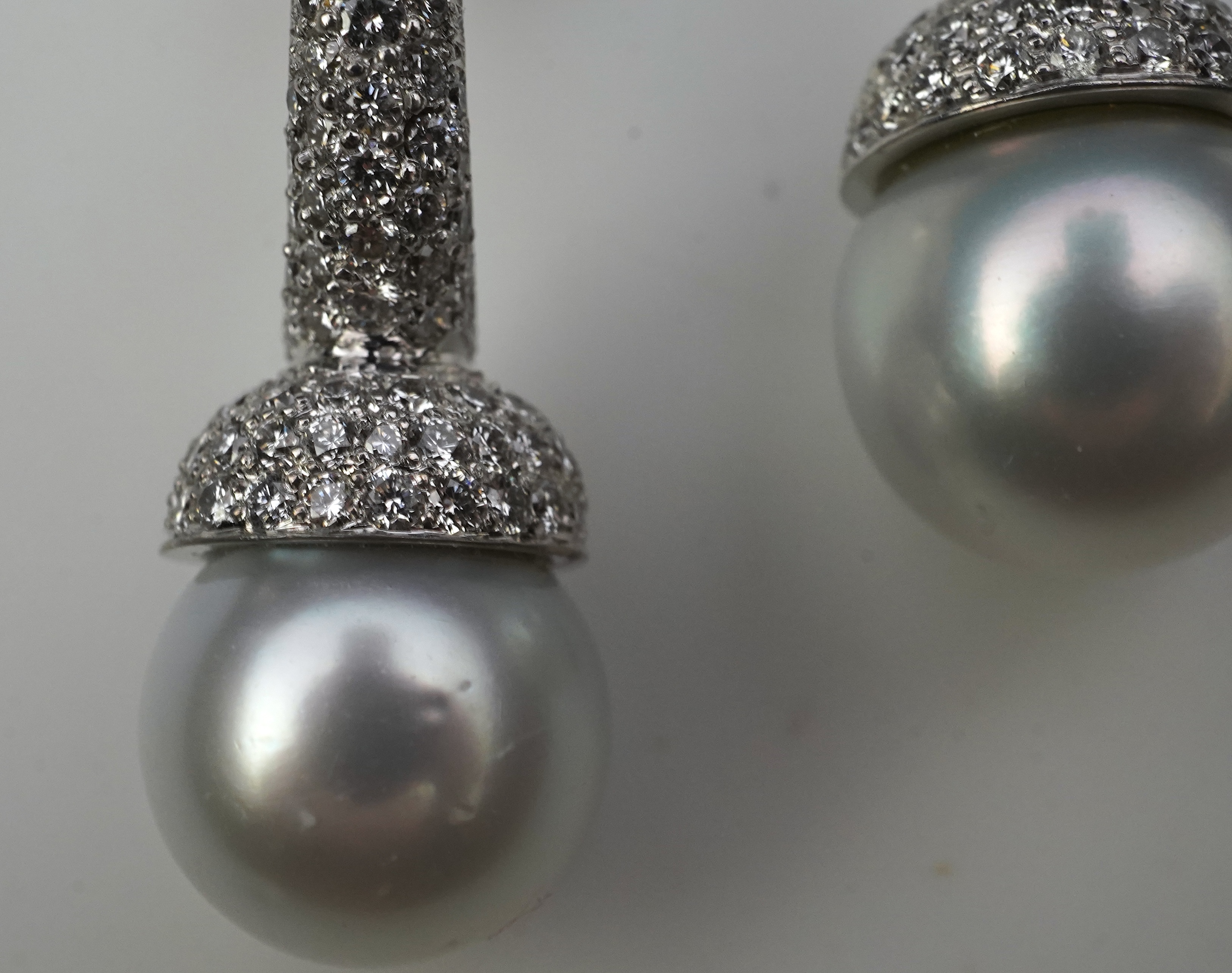 A pair of South Sea cultured pearl and diamond earrings